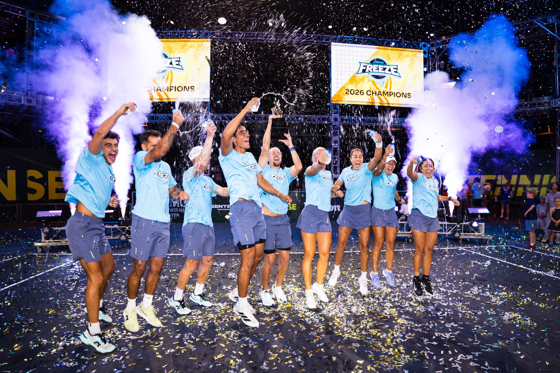 Players celebrating on court under confetti at the close of Championship Weekend.